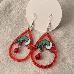 Grinch Hand Holding A Bell Christmas Earrings